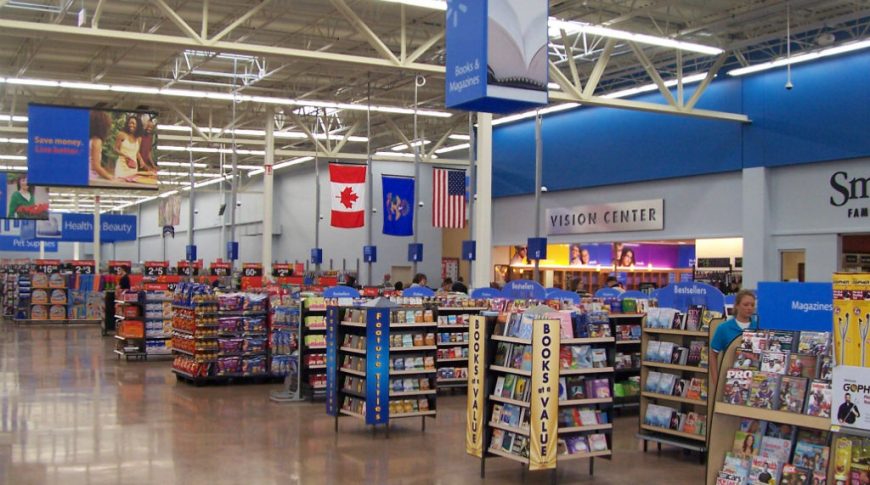 Interior of the front of the super store building overlooking the checkout lanes with vision center in the background