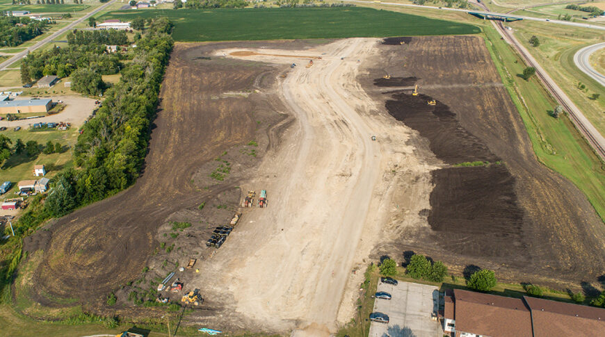 Aerial view of dirt work construction on an empty residential lot