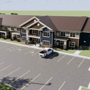 Exterior aerial rendering of White Shield Apartments, a two-story apartment building with dark blue, beige, and brown siding with brick accents on first floor.