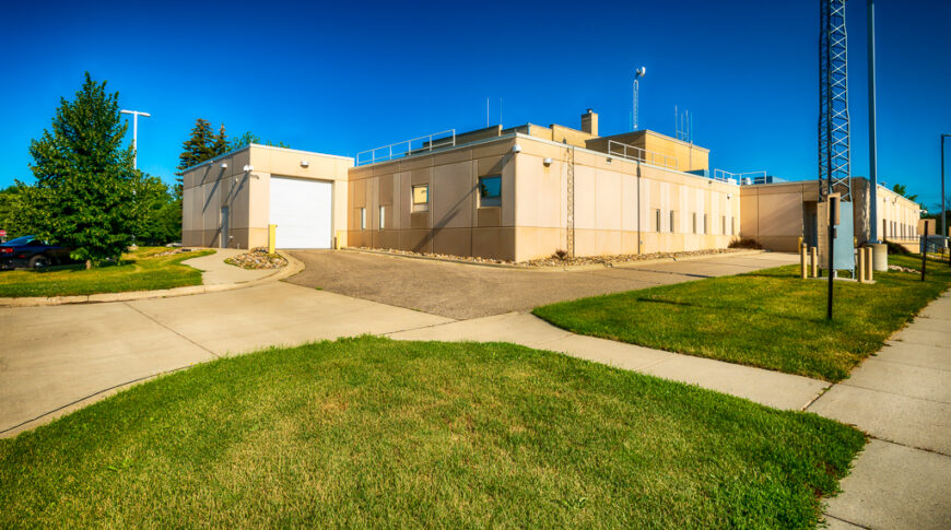Precast concrete exterior back view of Wilkin County Jail building.