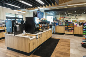 Coffee station at a Cenex C-store with checkout area in the foreground.