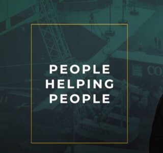 Yellow outlined transparent box with the words "People Helping People" inside it on a dark green and black picture overlayed background of a construction worksite.