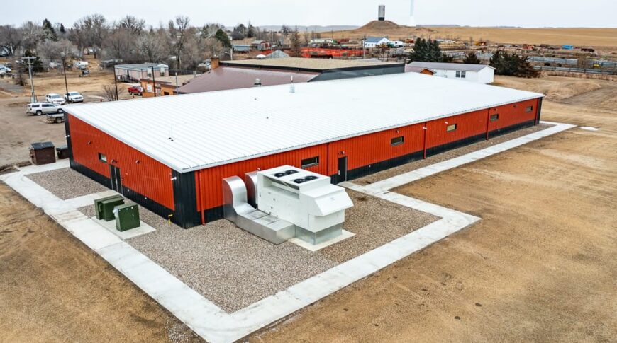 Exterior view from the air of new school addition and their mechanical systems.