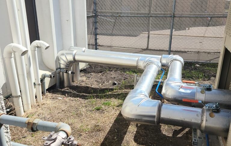 Tubing connecting the new chiller to the courthouse building.