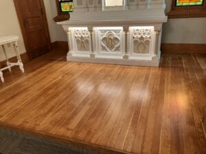 Refinished hardwood floors at the pulpit of the Immanuel Lutheran Church in Hankinson, ND.