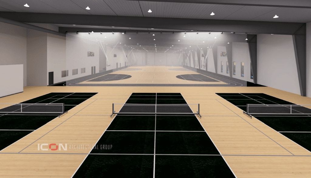 Interior rendering of the pickleball courts with dividing net to basketball courts behind.