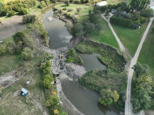 Aerial view of the collapsed Mayville Dam prior to reconstruction.