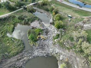 Aerial view of collapsed Mayville Dam.