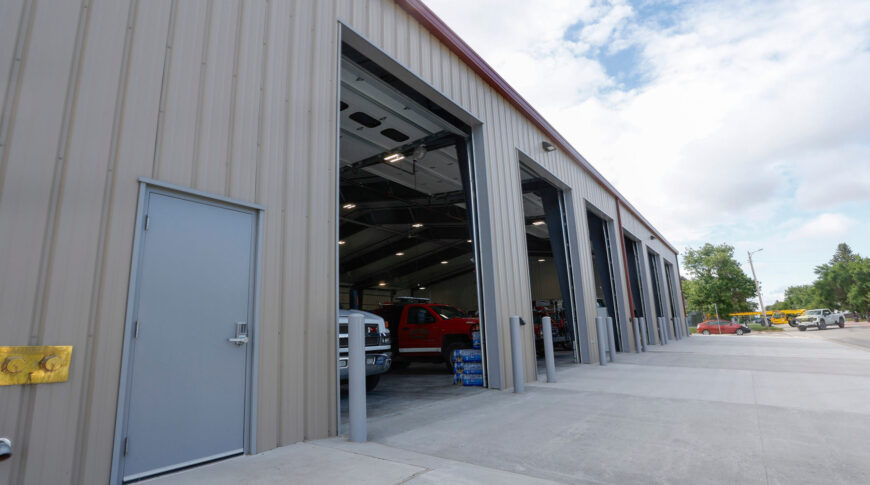 Bottineau Fire Hall - Low Res (18) Exterior prefabricated metal building of Bottineau Fire Hall with 6 large open truck bays.