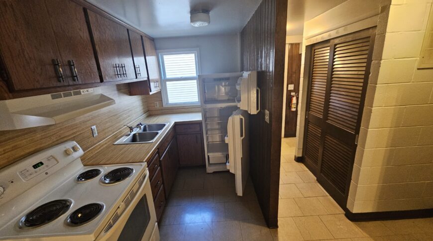 Before version of the NDSCS College Townhomes Kitchen/Entryway.